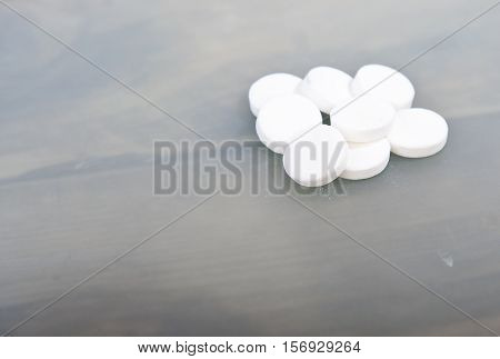 Traditional Dutch white candy Pepermunt on wooden background