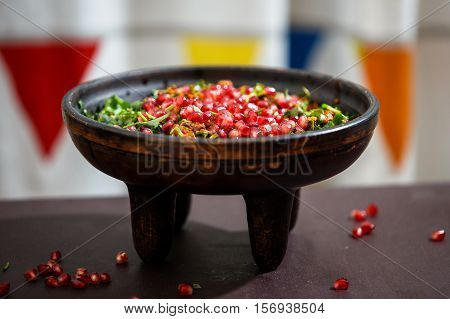 Kuchmachi - traditional Georgian dish of offal with grains of pomegranate