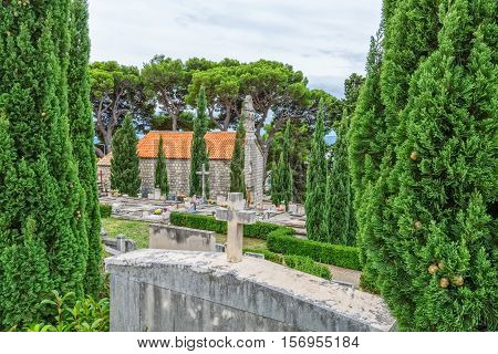 Virgin Mary old church on graveyard in Tucepi, Croatia.