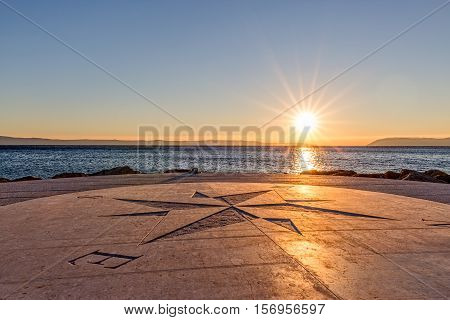 Beautiful sundown on the Tucepi town beach.