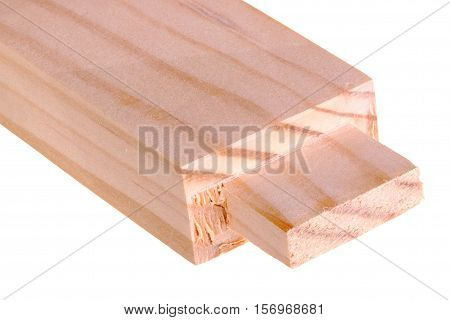 Close-up of the end of a pine board with a freshly cut woodworking tenon isolated against a white background