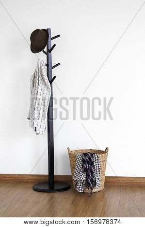Coat hanger in room on white background.