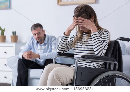 Depressed Women On A Wheelchair