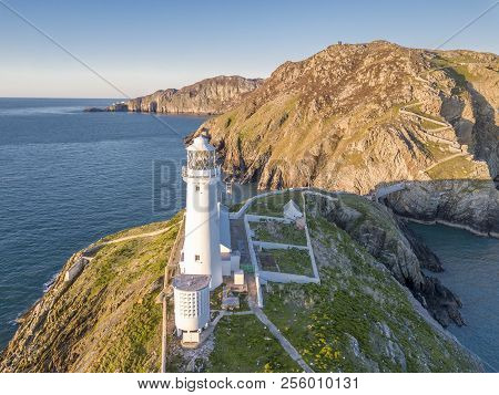 Aerial View Of The Beautiful Cliffs Close To The Historic South Stack Lighthouse On Anglesey - Wales