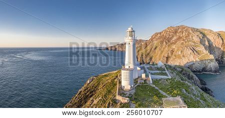 Aerial View Of The Beautiful Cliffs Close To The Historic South Stack Lighthouse On Anglesey - Wales