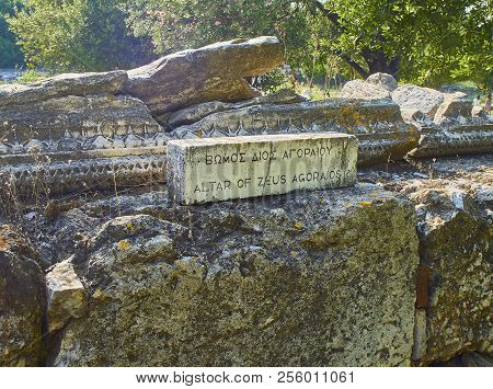 Ancient Agora Of Athens With The Acropolis In Background. Greece.