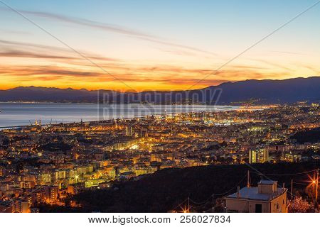 Genoa (genova), Italy, March  10, 2017 - Aerial View Of The City Of Genoa (genova) At Dusk.
