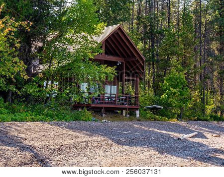 A Cabin That Is Nestled Neatly Into The Forest Offers The Quiet, Serene Getaway.