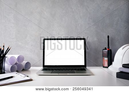 Mockup Computer Laptop On Engineer Workspace Table.