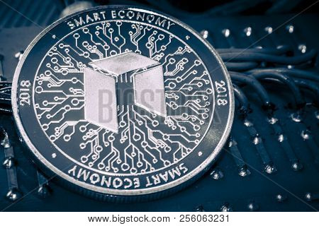 Neo Cryptocurrency Coin On Grey Shiny Background.