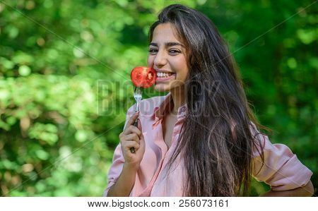 Seductive Appetite. Girl Holds Fork With Juicy Ripe Tomato. Girl Seductive Eats Red Vegetable. Woman