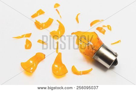 Damaged Light Bulb And Glass Shards