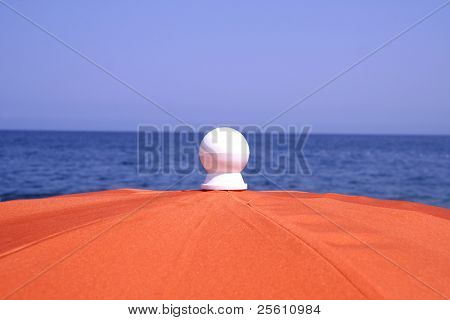 orange parasol at seaside