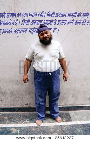 DELHI - SEPTEMBER 22:  Portrait of sikh devotee at Sis Ganj Gurdwara temple on September 22, 2007 in Delhi, India. Worldwide there are about 25 million Sikhs.