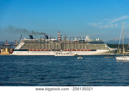 Luxury Cruise Ship In The Port Of La Spezia. In The Background The Apuan Alps (alpi Apuane). Liguria