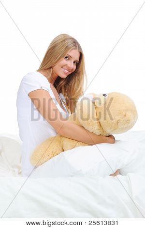 Ung kvinde med bamse