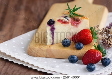 Mixed Berry Butter Cake With Fresh Blueberries And Strawberries On Wooden Plate. Delicious Butter Ca