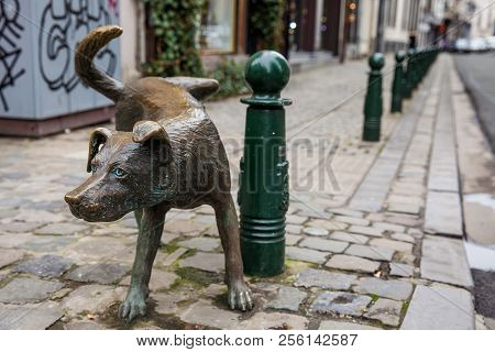 Brussels, Belgium - March, 2018: Dog Peeing Statue Called Zinneke Pis