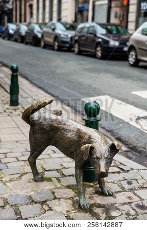 Brussels, Belgium - March, 2018: Dog Peeing Statue Called Zinneke Pis