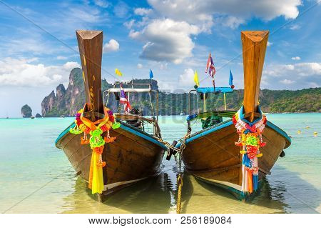 Traditional Thai Longtail Boat At Log Dalum Beach On Phi Phi Don Island, Thailand In A Summer Day