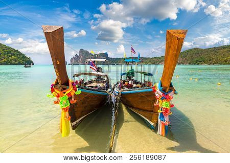 Traditional Thai Longtail Boat At Log Dalum Beach On Phi Phi Don Island, Thailand In A Summer Day