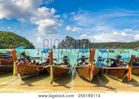 Traditional Thai Longtail Boat At Log Dalum Beach On Phi Phi Don Island, Thailand In A Summer Day