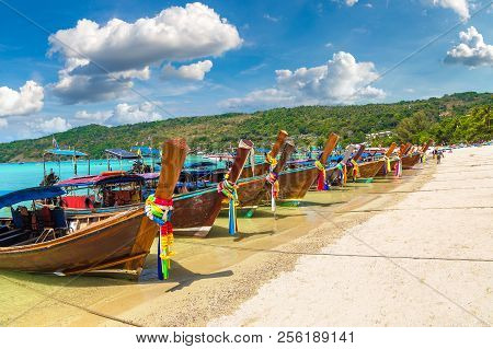 Traditional Thai Longtail Boat At Log Dalum Beach On Phi Phi Don Island, Thailand In A Summer Day
