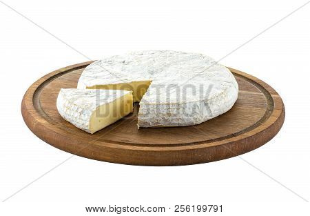 Brie Cheese With Cut Sice On Wooden Board. With Clipping Path.