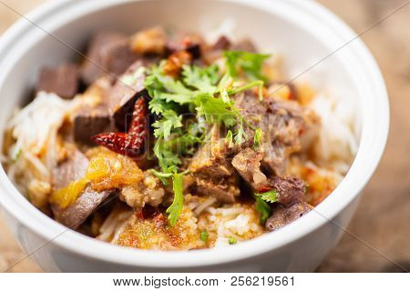 Northern Thai Food (kanom Jeen Nam Ngeaw) With Vegetables On Wooden Background,spicy Rice Noodles So