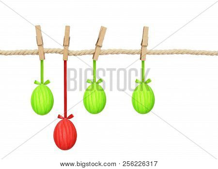 Cotton Rope And Four Pins With Hanging Easter Painted Eggs Isolated On White Background