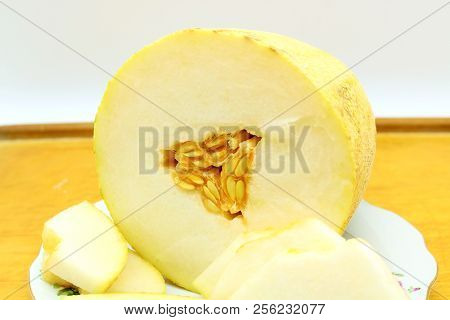 Melon Is Delicious And Juicy On A Plate. Melon Torpedo.