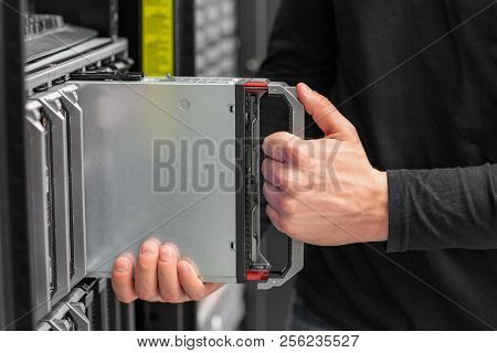 Close-up Of It Consultant Install Blade Server In Datacenter