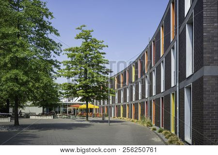 Colour Window Sills On A Curved Side Of A Building In Dusseldorf, Germany.