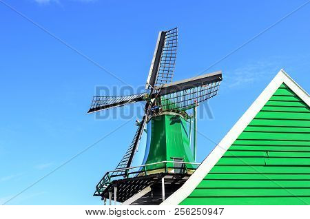 Roof Of A Mill Against A Blue Sky.