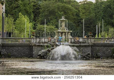 The Monument Of Tritonenbrunnen In The Area Of Königsallee, Dusseldorf, Germany.