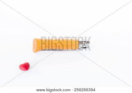 Folded Knife And Heart. A Pocket Knife With A Wooden Handle. Isolate.