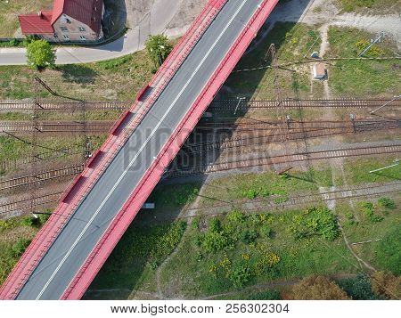 Aerial view on intersection of railroad and car road