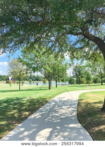 Beautiful Green Park With Pathway Trail In Coppell, Texas, Usa