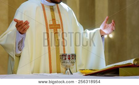 Holy Communion On Table In Church Cup Of Glass With Red Wine And Bread, Prayer For Wine