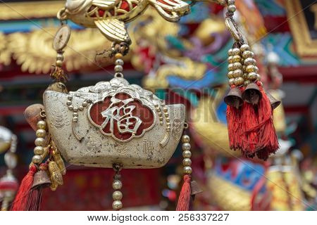 A Dolden Sparkling Coin Of China Hanging