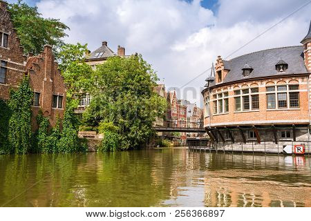 Ghent, Belgium - August 14, 2015 - Old Colorful Traditional Houses Along The Canal In The Historical