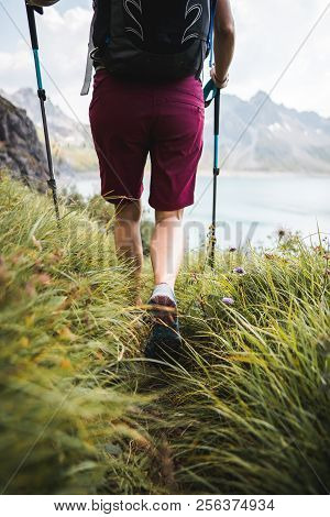 Adventurous Sportive Girl Hiking At A Lake In Beautiful Alpine Mountains