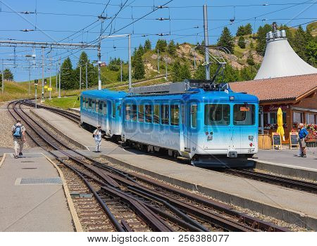 Mt. Rigi, Switzerland - July 19, 2018: A Passenger Train Standing At A Platform Of The Rigi-staffel 