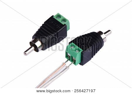 An Adapter That Converts The Terminal For Speaker Wire Into An Rca Type