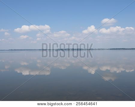 Amazing Landscapes Of Artificial European Goczalkowice Reservoir In Poland With Beauty Clouds On Blu