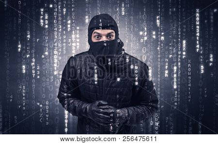 Burglar in action with encoded concept and his tools in his hand. 