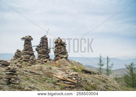 Rock Pillars On Top Of The Hillock Dedicated To A Local Tutelary Deity