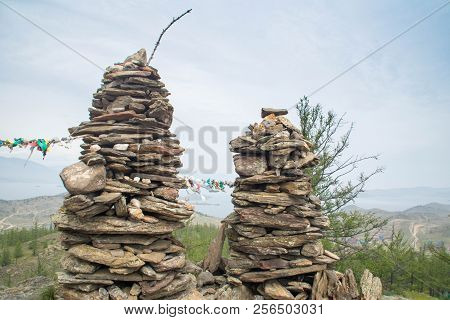 Rock Pillars On Top Of The Hillock Dedicated To A Local Tutelary Deity