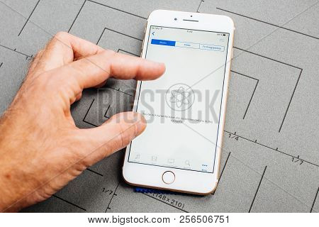 Paris, France - Sep 26, 2016: Male Hand Holding New Apple Iphone 7 8 Plus Smartphone After Unboxing 
