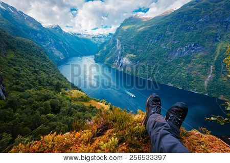 Breathtaking view of Sunnylvsfjorden fjord and famous Seven Sisters waterfalls, near Geiranger village in western Norway.